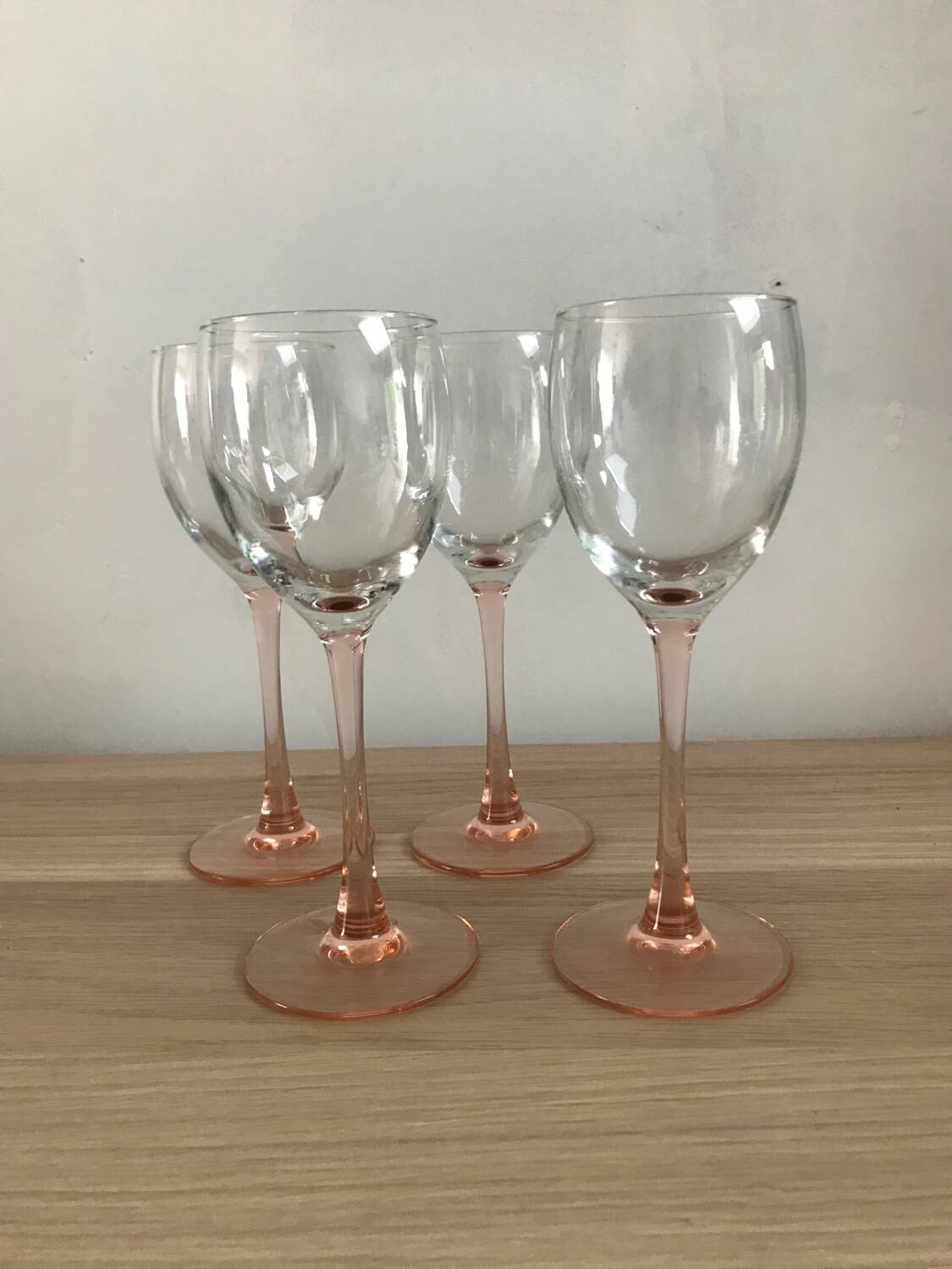 4 luminarc wine glasses with pink base