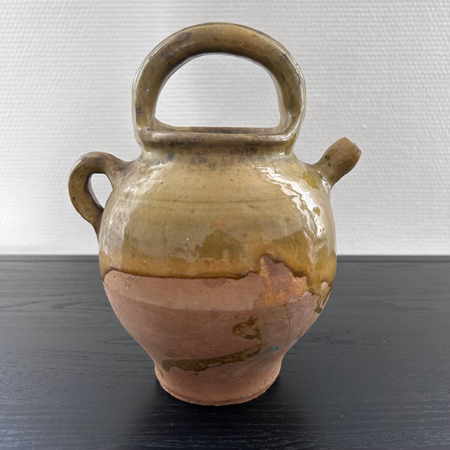 Antique two-material water jug