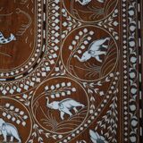 Vintage Indian teak coffee table inlaid with elephant motifs, mid-20th century.