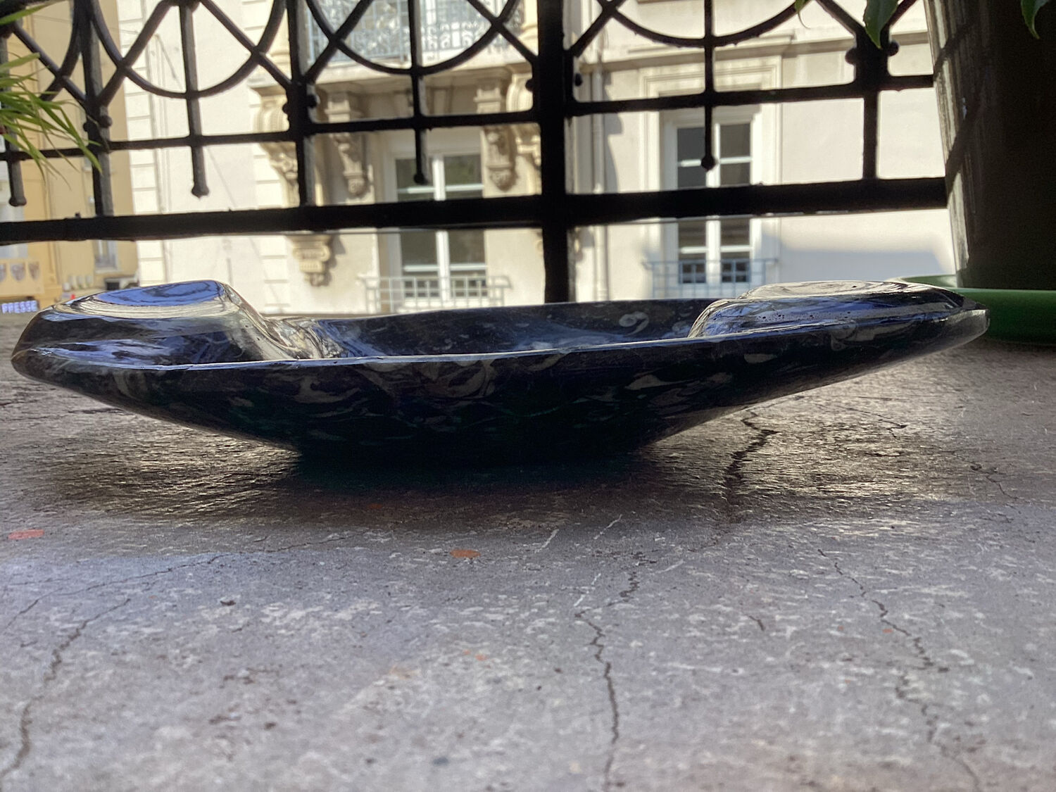 Empty tray pocket in fossilized stone