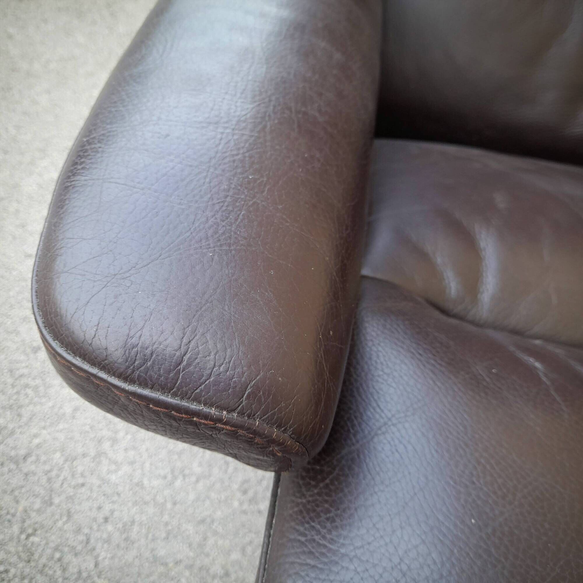 Pair of Scandinavian leather armchairs and ottoman, Ekornes, Norway, 1970