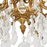 Louis XV style chandelier in gilded bronze with 6 light arms.