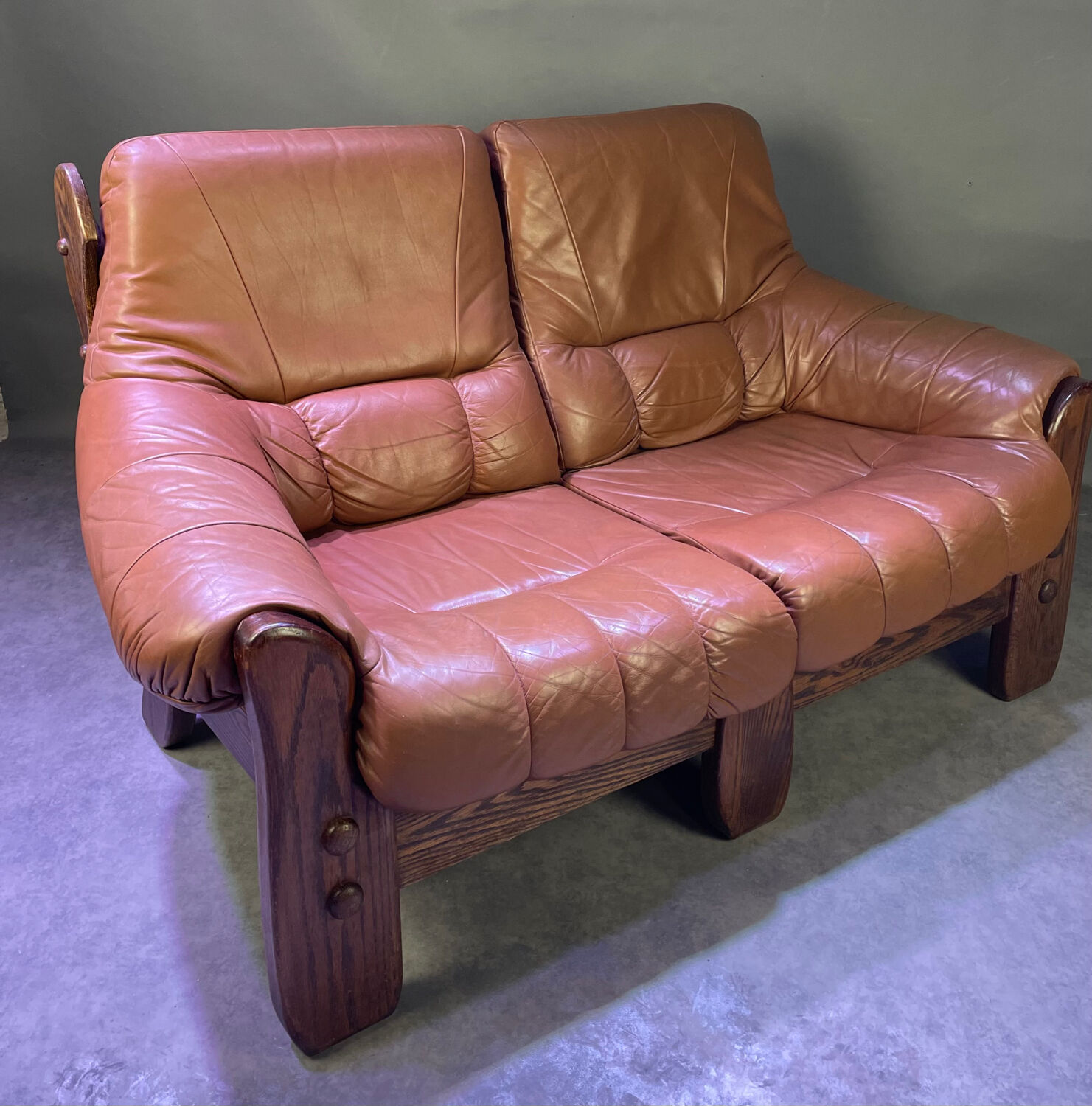 Brutalist style wood and leather sofa