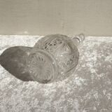 Old carafe in worked glass