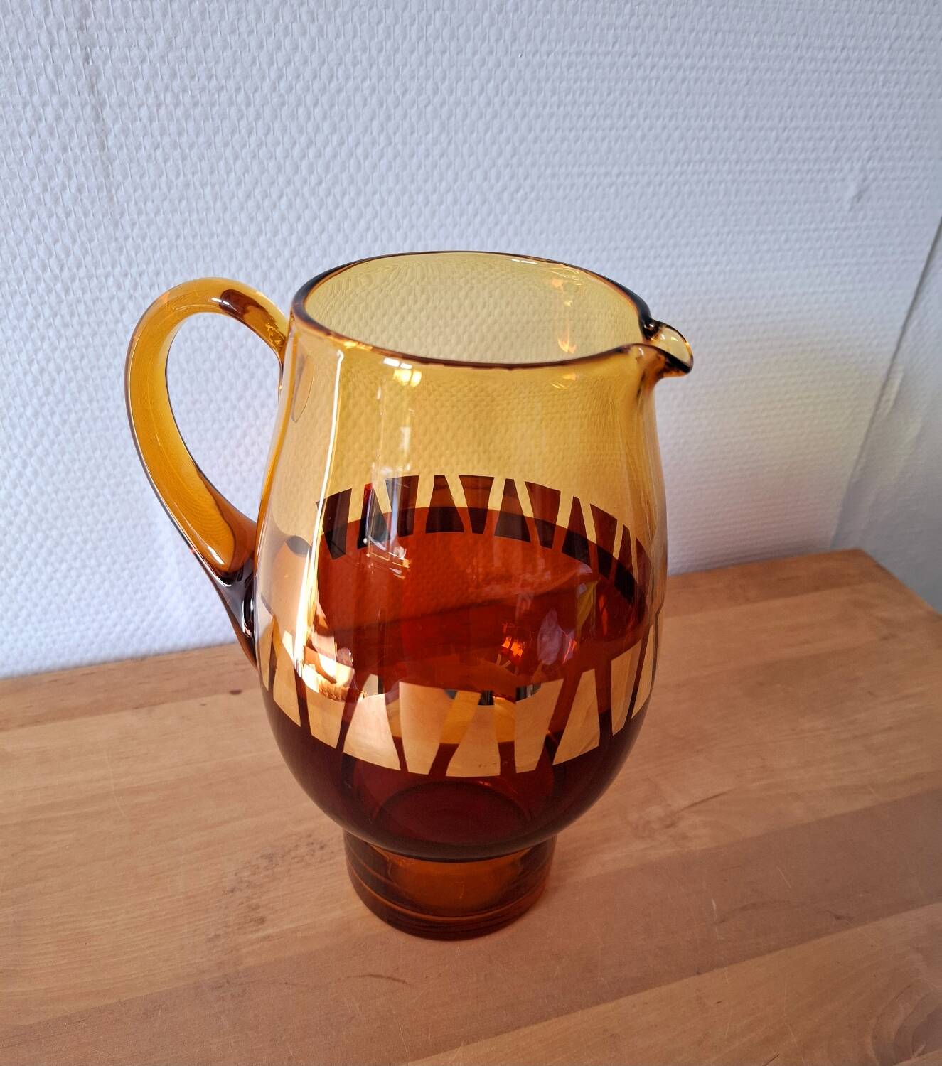 Carafe and its amber/golden glasses from the 70s.