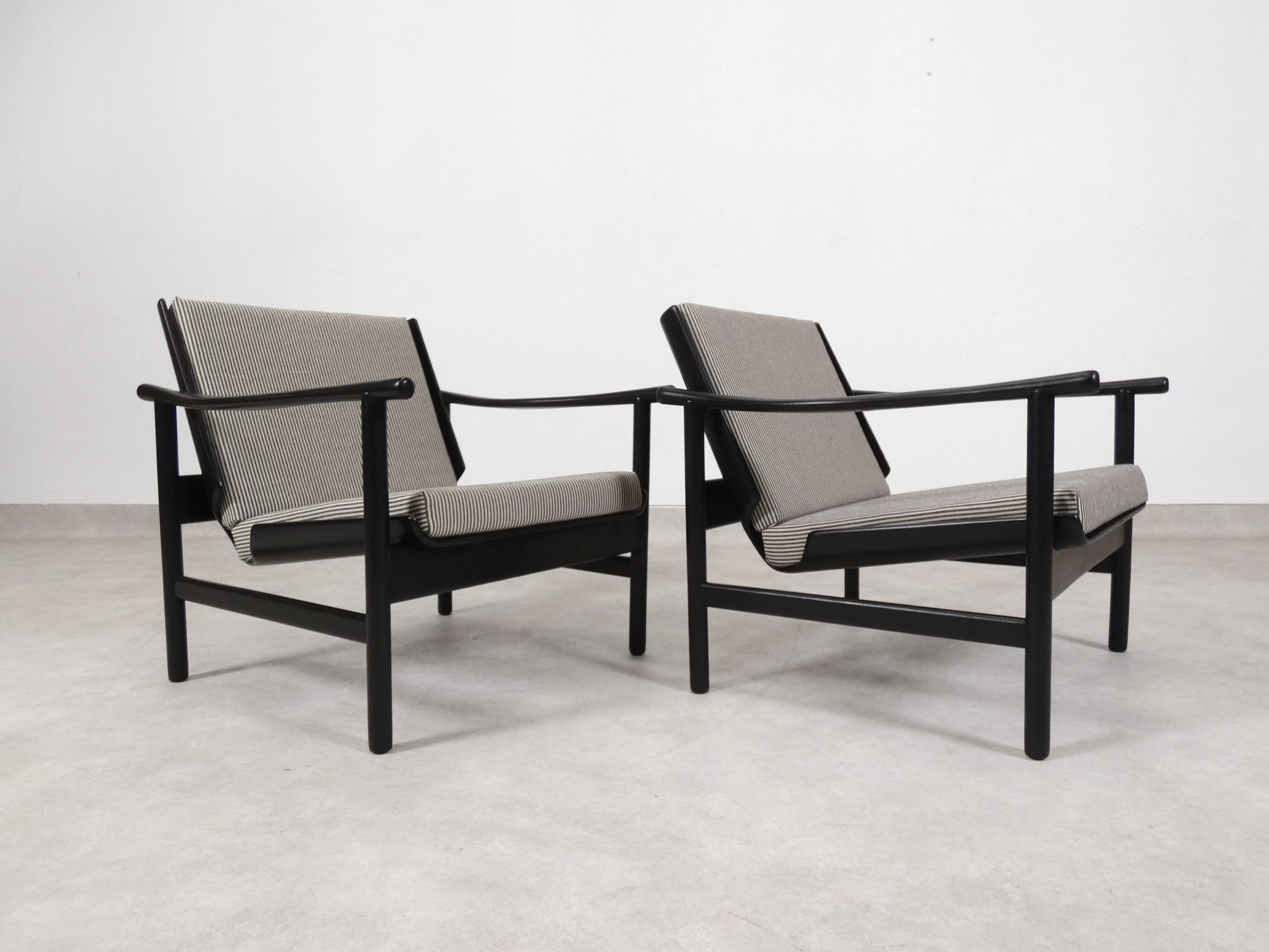 2x wooden Scandinavian arm chairs