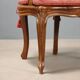 Antique baroque-style armchairs in walnut and fabric, 19th century.