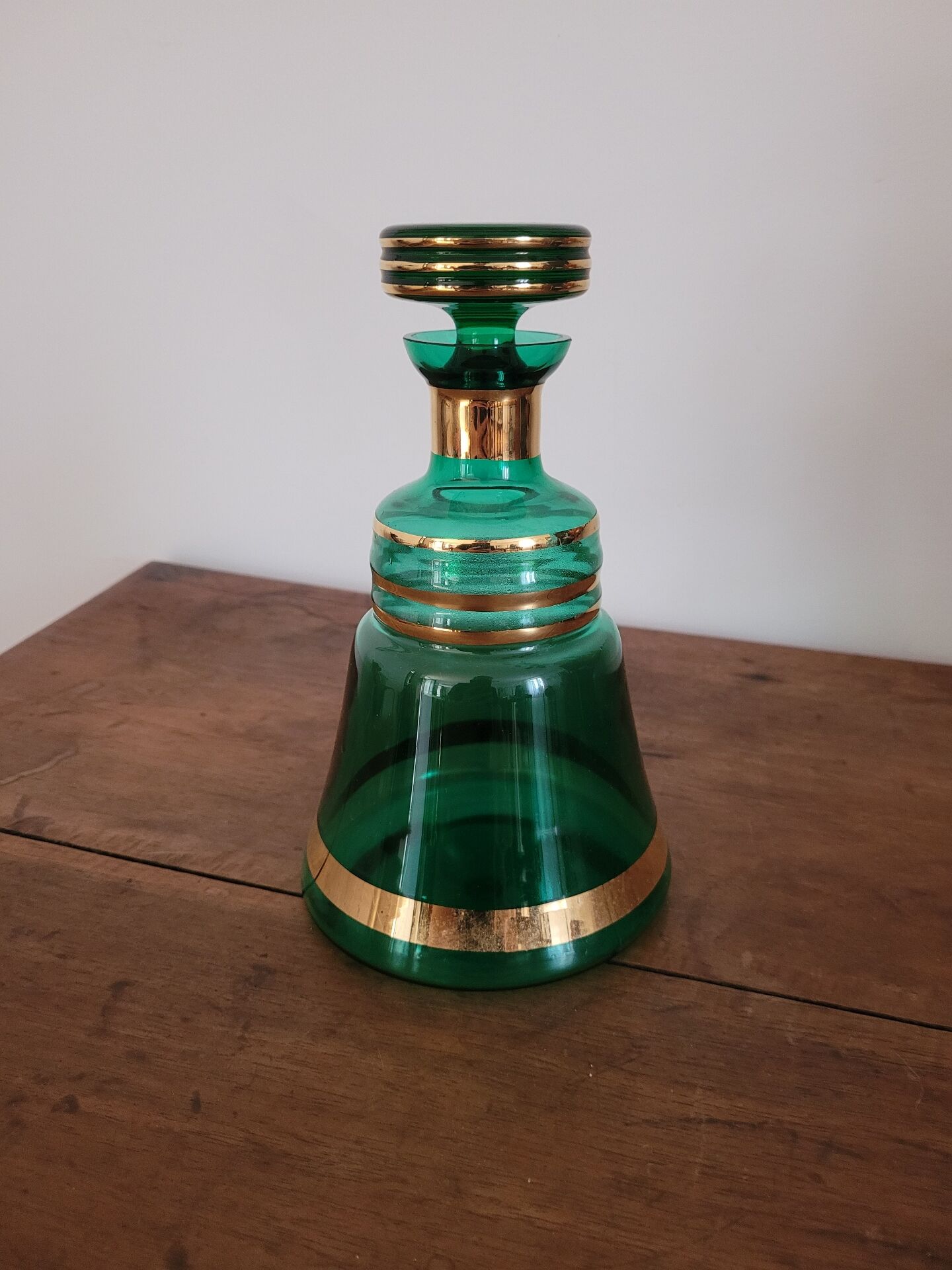 Green and gold glass carafe