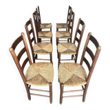 Set of 8 wooden chairs with rattan seats from the 1950s