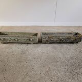 Old planters in faux cement wood
