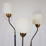 Golden brass tripod lamppost