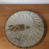 Sun mirror in gilded metal