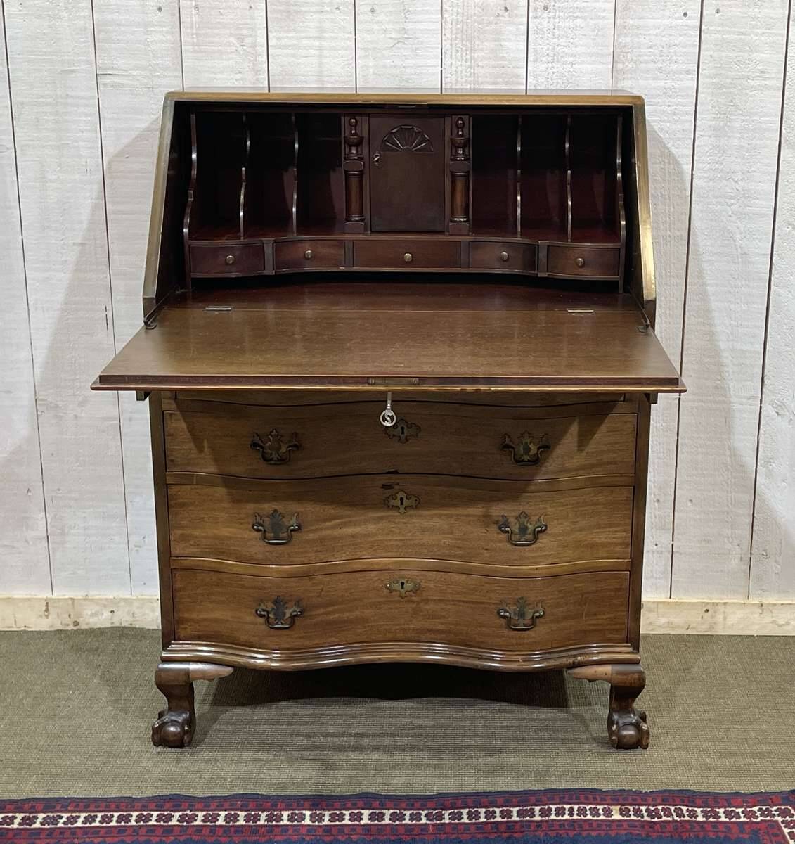 1930s English curved mahogany back desk