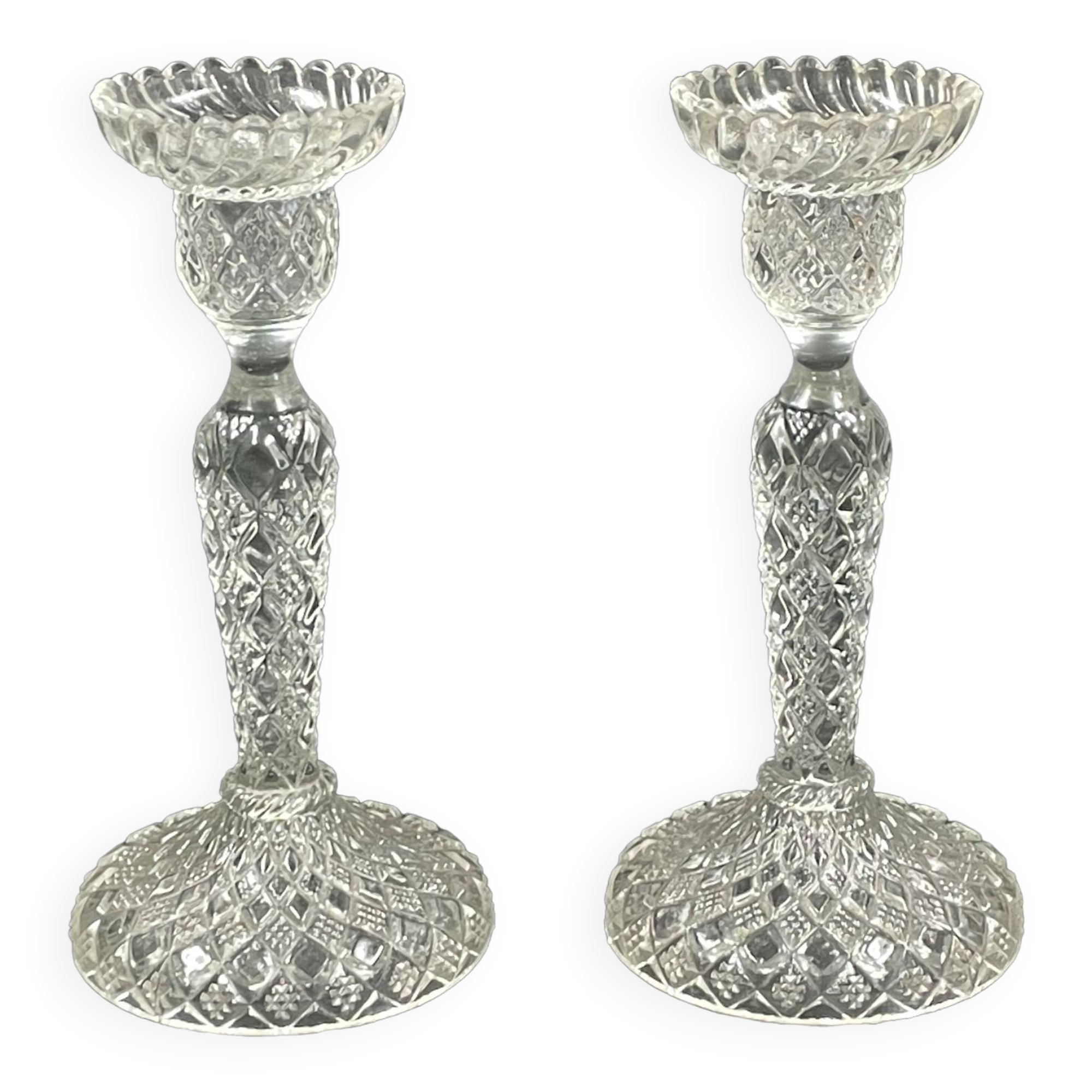 Pair of candle holders in molded glass