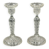 Pair of candle holders in molded glass