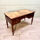 Bureau plat en acajou et plume d’acajou pieds Jacob d’époque Louis Philippe XIXème siècle