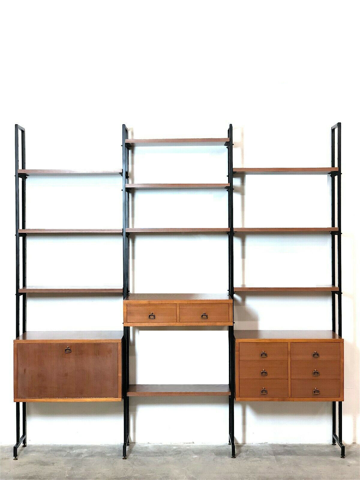 Modular storage unit and teak bookcase. Italy, 60s