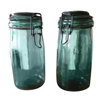 2 green glass jars