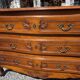 Curved commode in Louis XV style made of cherry wood.