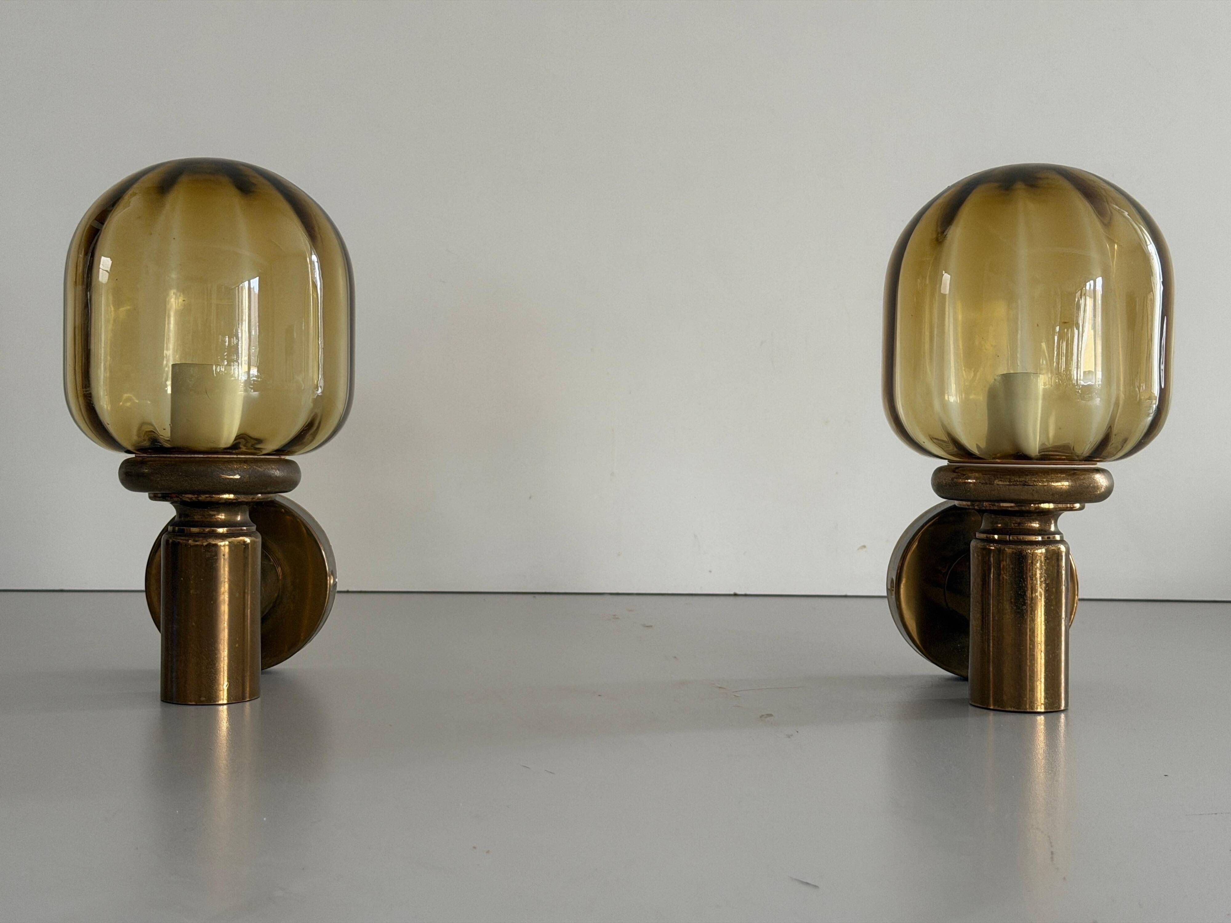 Pair of yellow glass and brass wall lights from the mid-century by N Leuchten, 1960s, Germany.