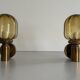 Pair of yellow glass and brass wall lights from the mid-century by N Leuchten, 1960s, Germany.