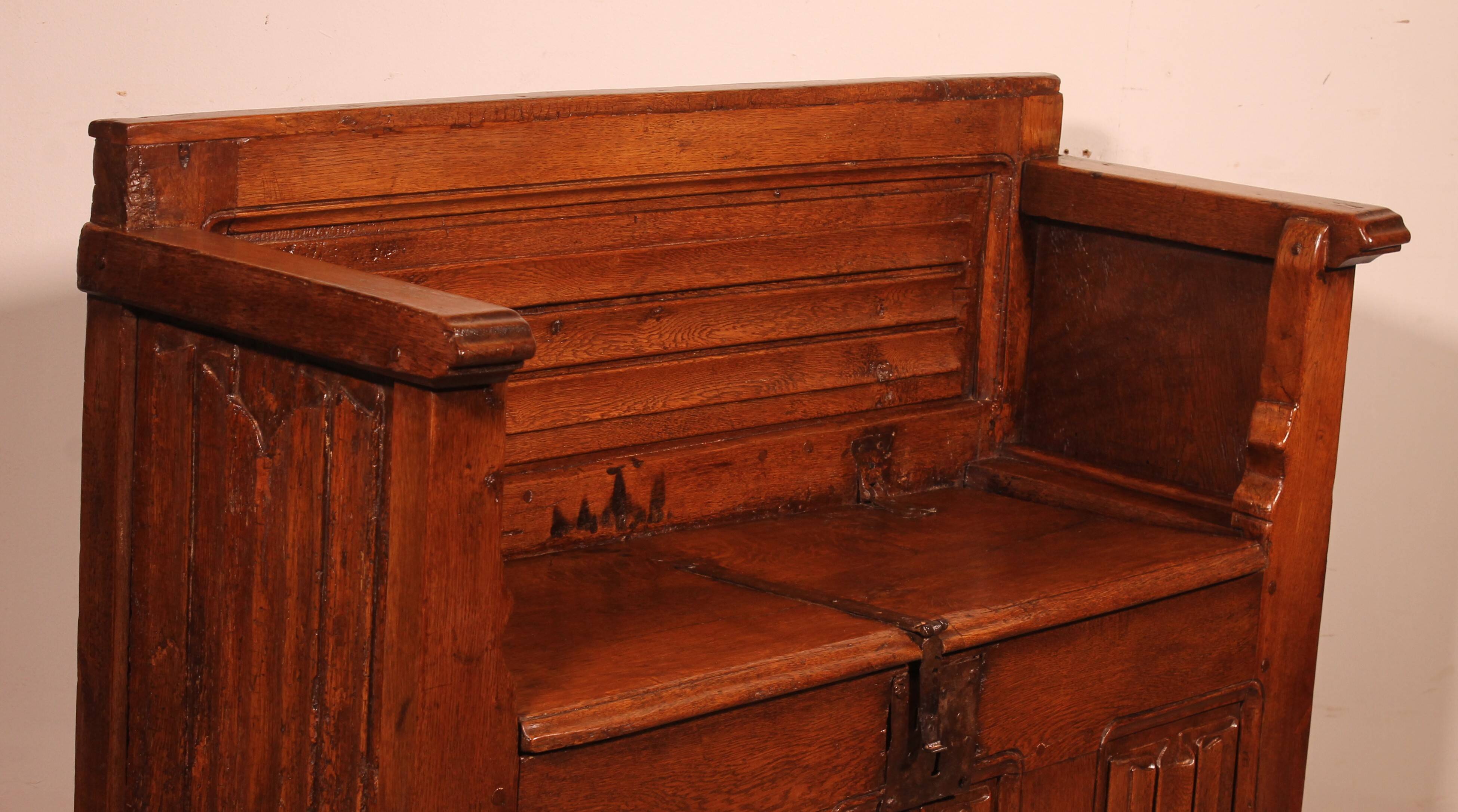 Oak bench chest with incorporated panels and gothic elements