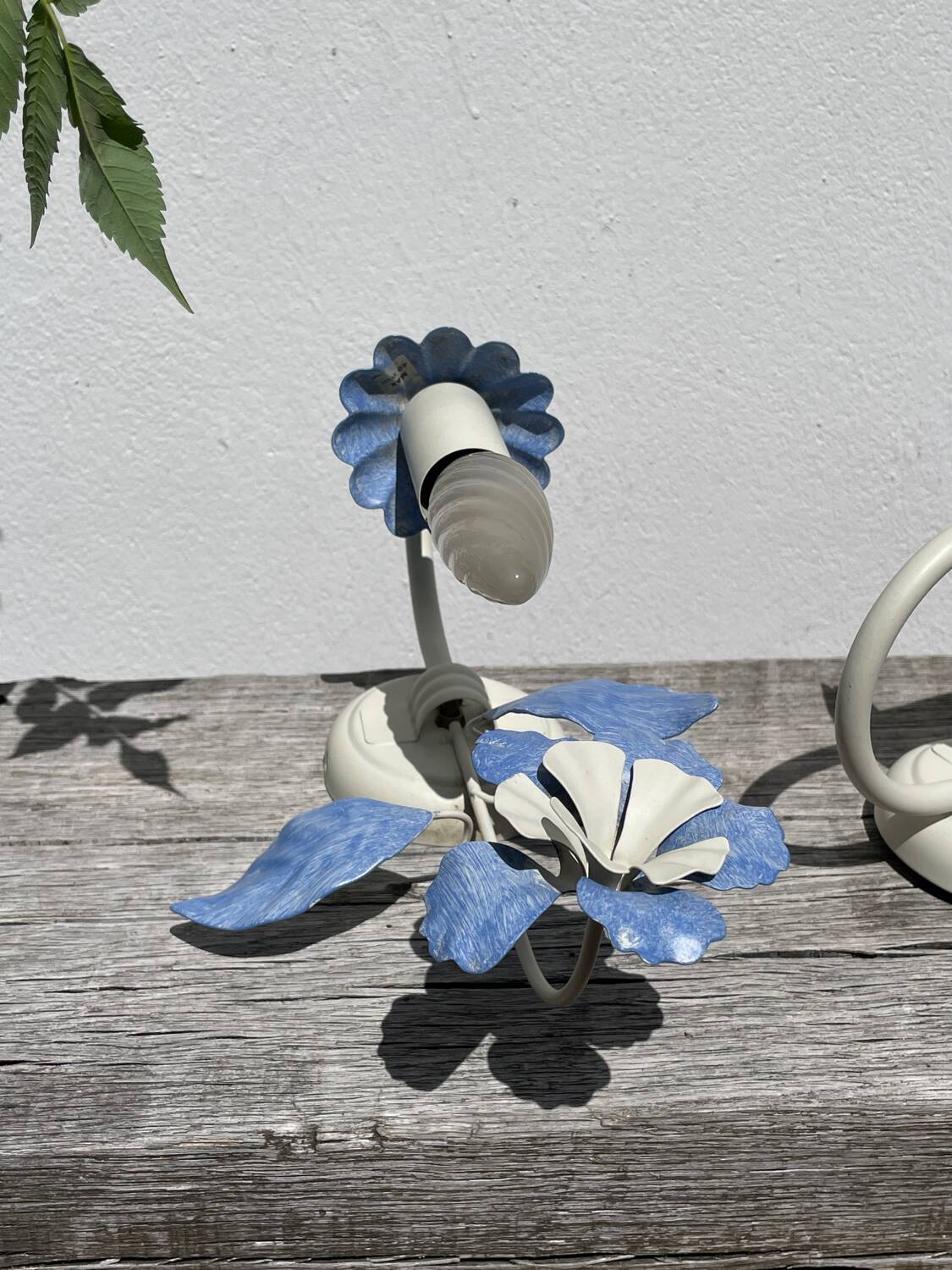 Pair of blue metal floral wall lights