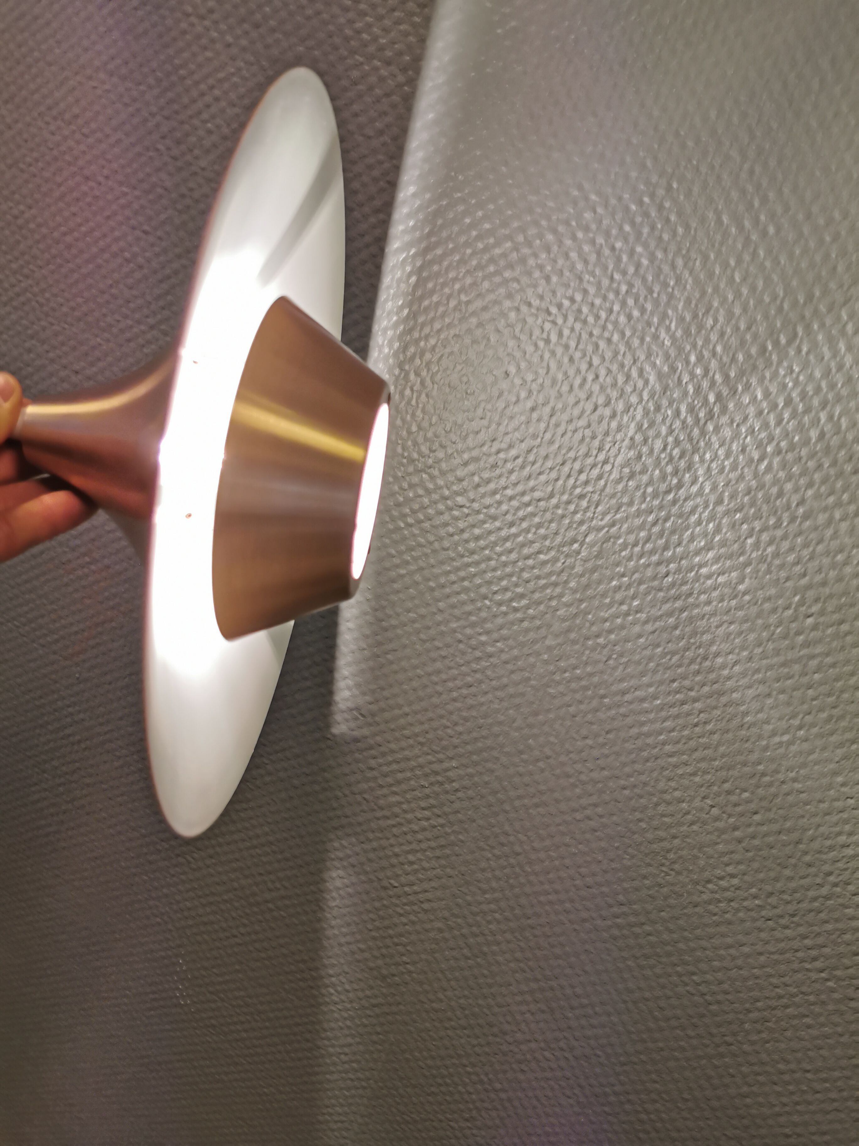 Ufo-like Danish hanging lamp, estimated from the 80s, made in copper colored lacquer.