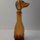 Amber glass bottle representing a dog, Empoli Italy 60s