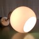 Swan neck wall lamp in gilded brass and opaline globe - mid-20th century