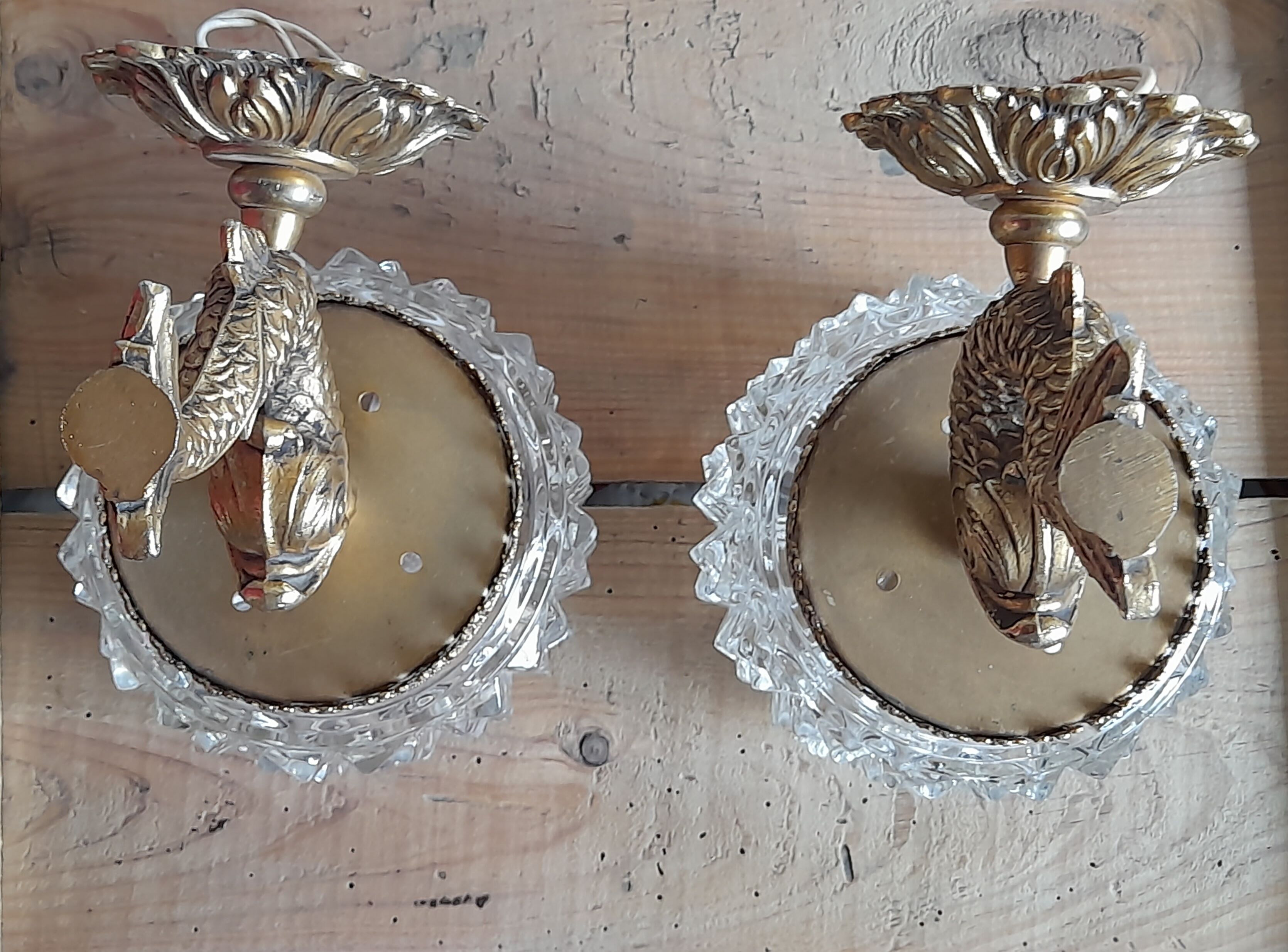 Pair of dolphin brass sconces