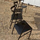 Series of 4 black iron chairs
