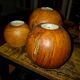 Set of 3 spherical olive wood candle holders in boho style.