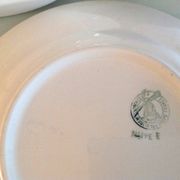 Set of six flat plates and one Moulin des Loups bowl, green tablecloth model/1950s-1960s