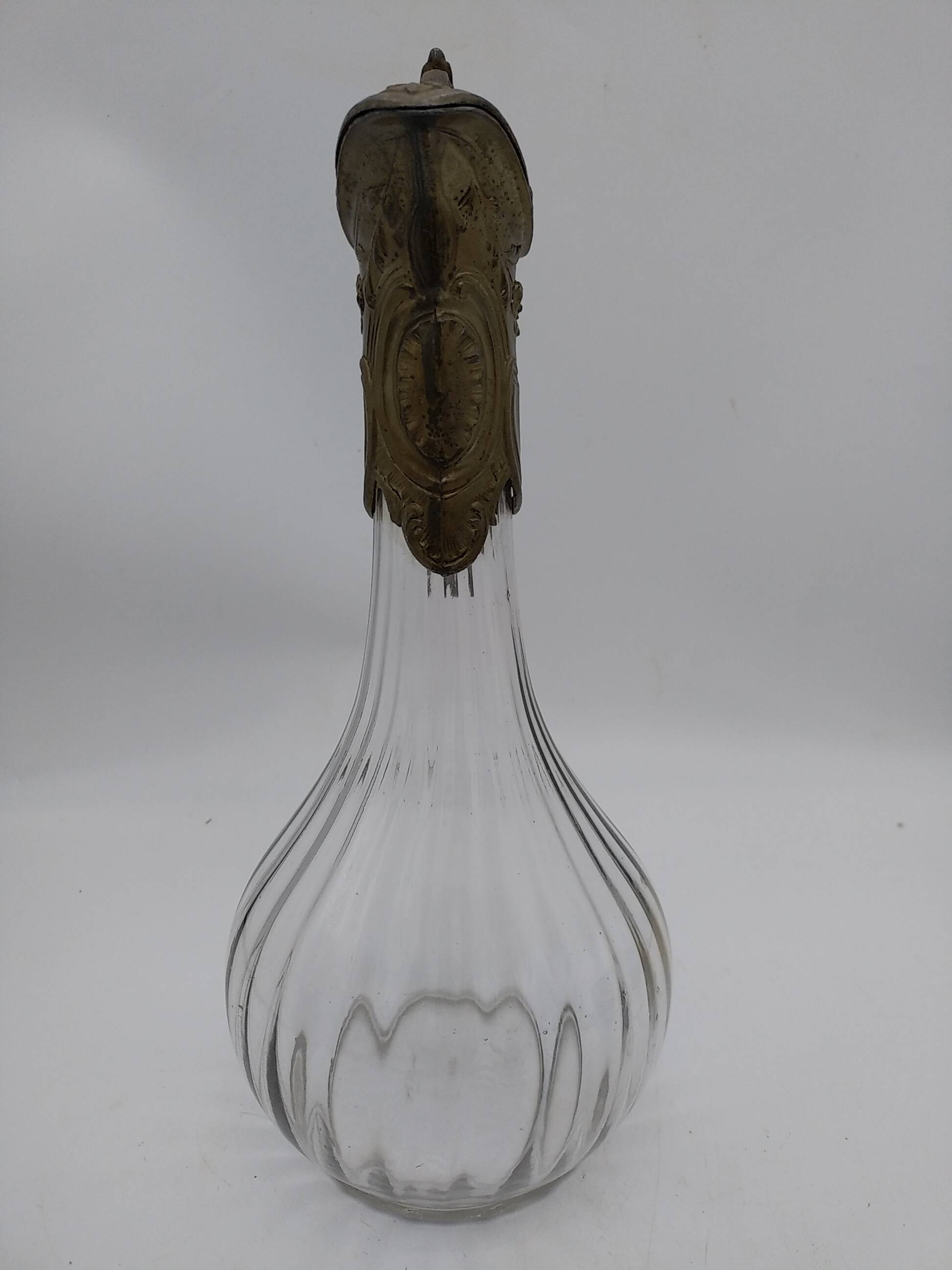 Large balloon glass carafe with pewter frame.