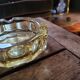 Amber glass ashtray – 1960s–70s