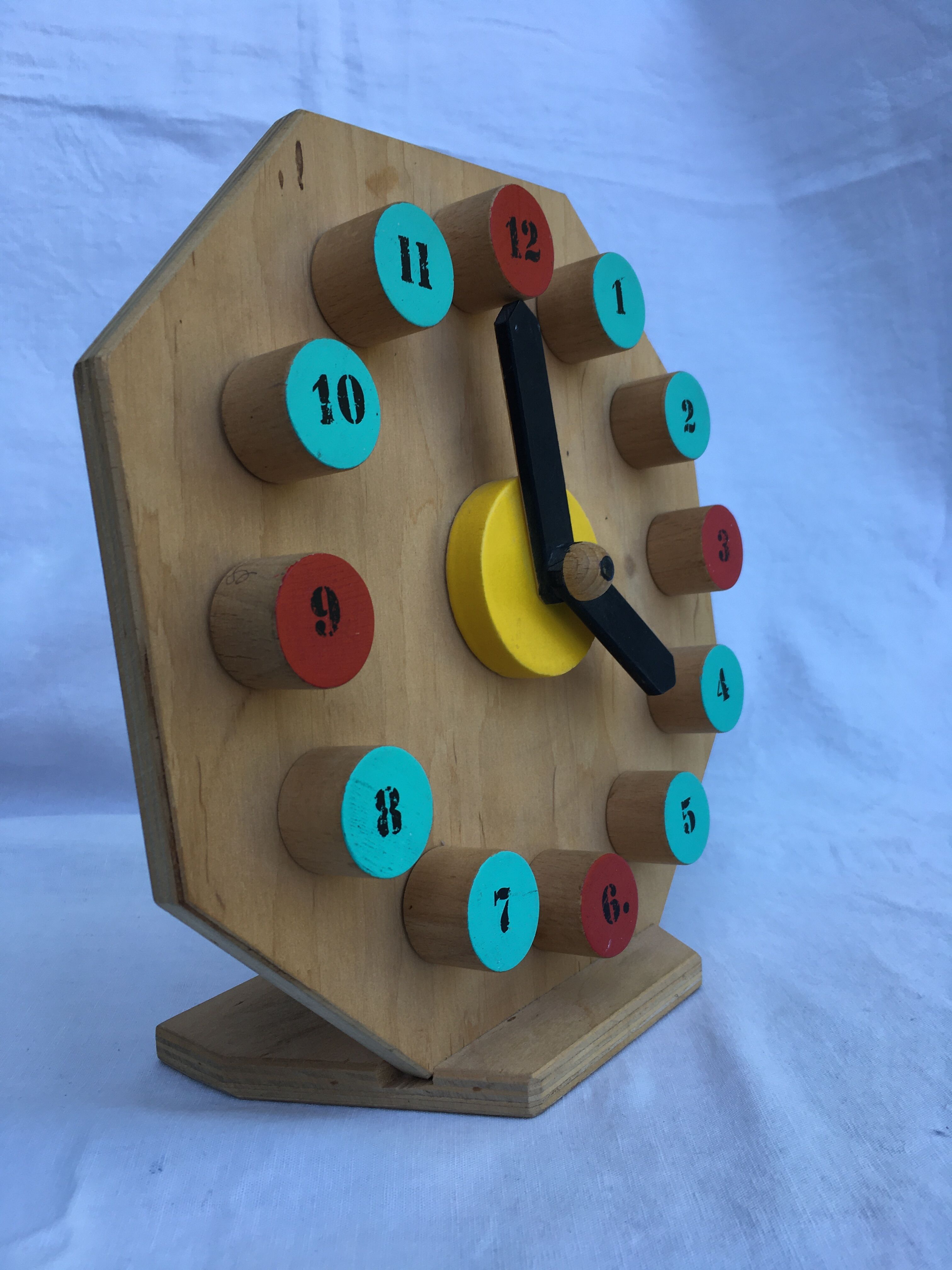 Painted wooden toy clock