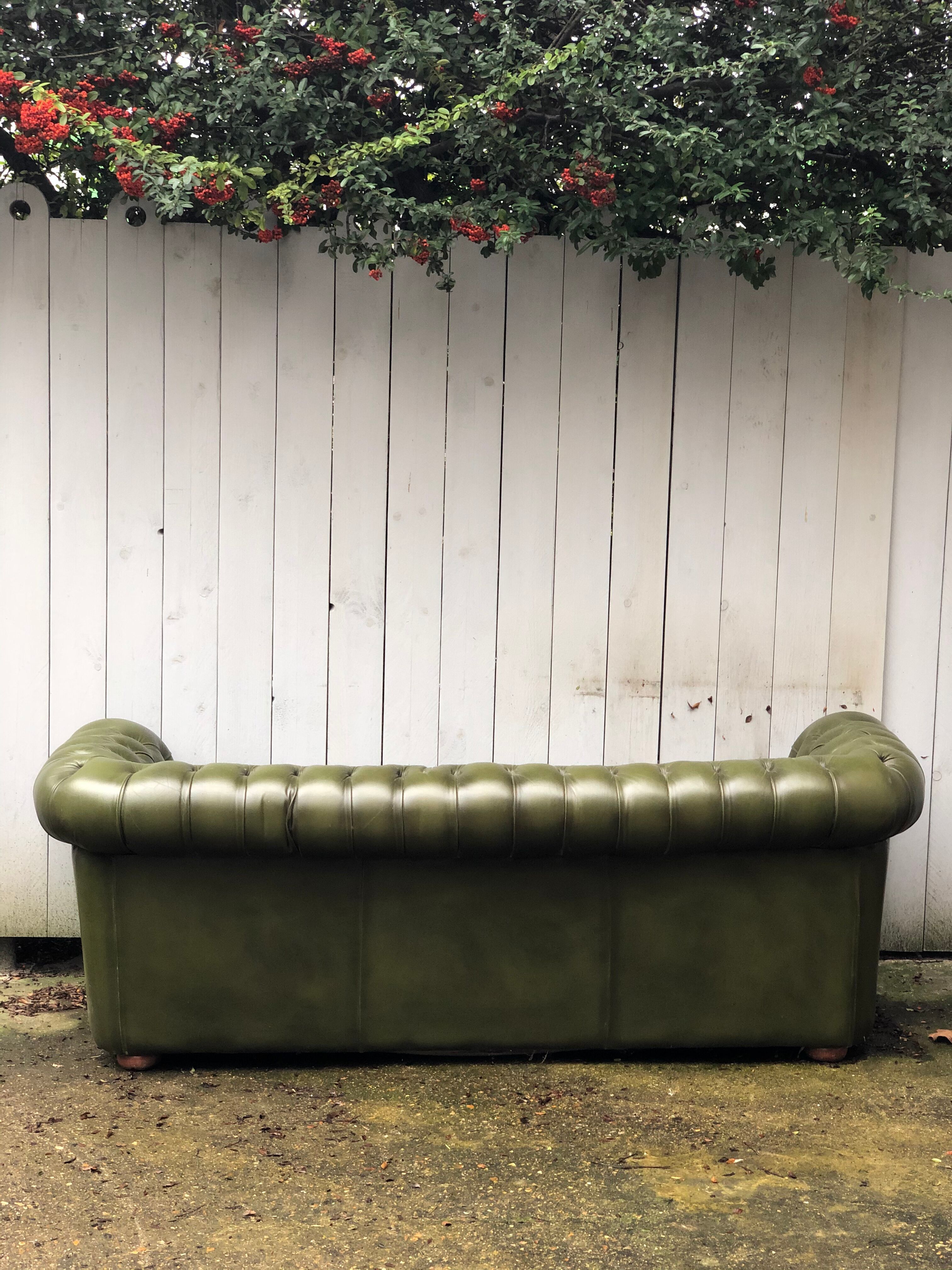 Chesterfield green leather sofa