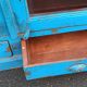 Old wooden glazed cabinet with two doors and two drawers