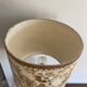 Antique table lamp in marble and tapestry