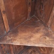 Old wooden corner cabinet