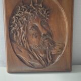 Face of Christ carved on wood