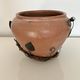 Decorative pot holder in wrought iron and wood