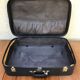 Former skai black travel suitcase