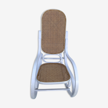 Rocking-chair sitting and canine backrest 70s