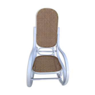 Rocking-chair sitting and canine backrest 70s