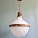 Large Art Deco pendant light in milky glass and brass, 1920