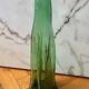 Vintage Viresa bottle in a flattened shape.