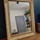 Mirror patinated wood frame gilded