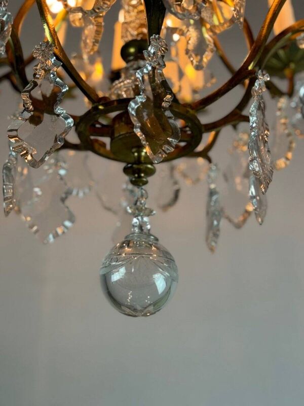 Lustre cage de style Louis XV en bronze doré garni de pampilles vers 1920